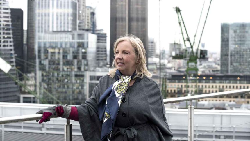 Deborah Meaden smiling at a business event.